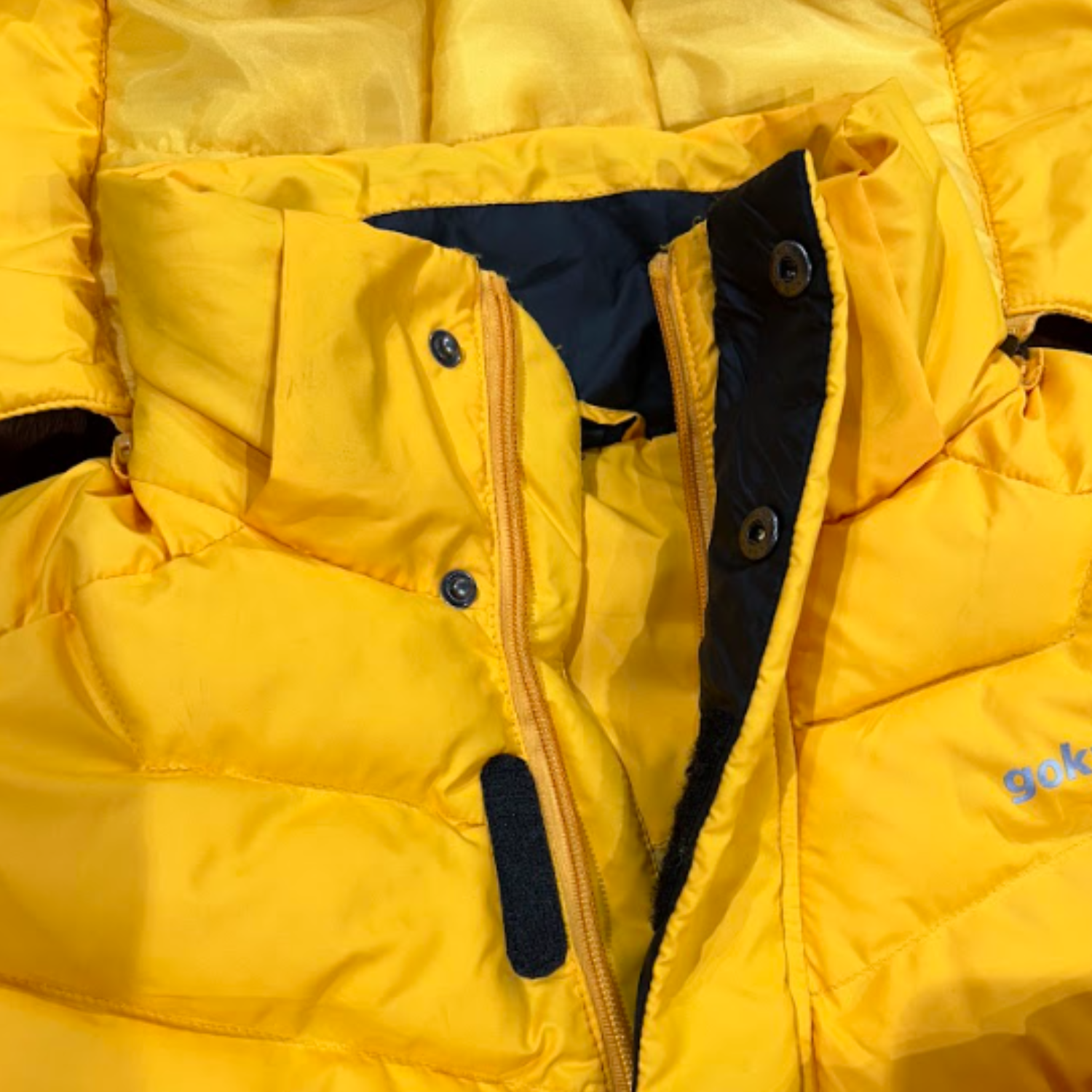 Hood with locking system