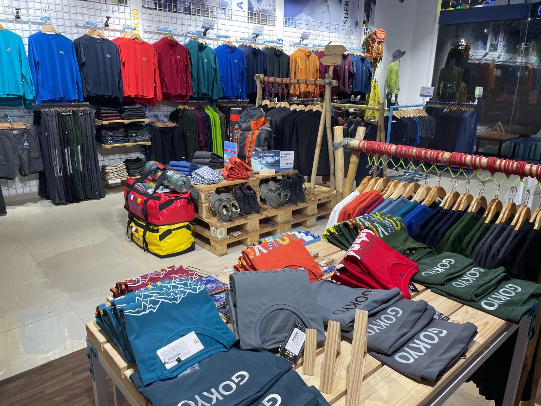 Display of trekking apparel and gear inside Gokyo Outdoor Clothing & Gear Malad store.