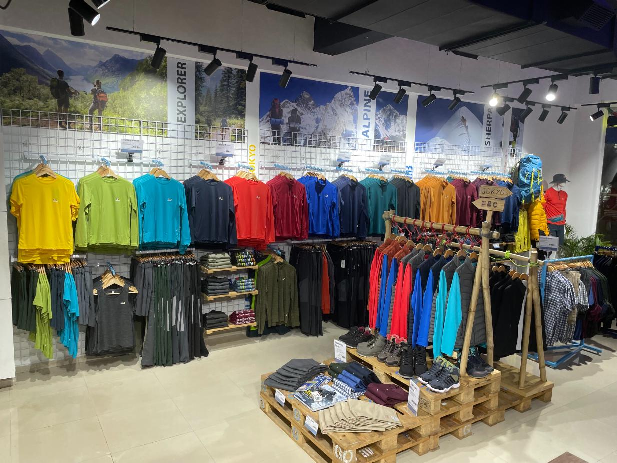 Organized layout of clothing and accessories inside Gokyo Outdoor Clothing & Gear Malad store.