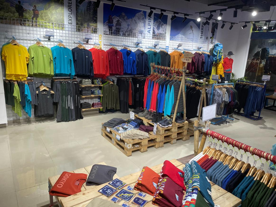 Mixed display of outdoor clothing and gear inside Gokyo Outdoor Clothing & Gear Malad store.