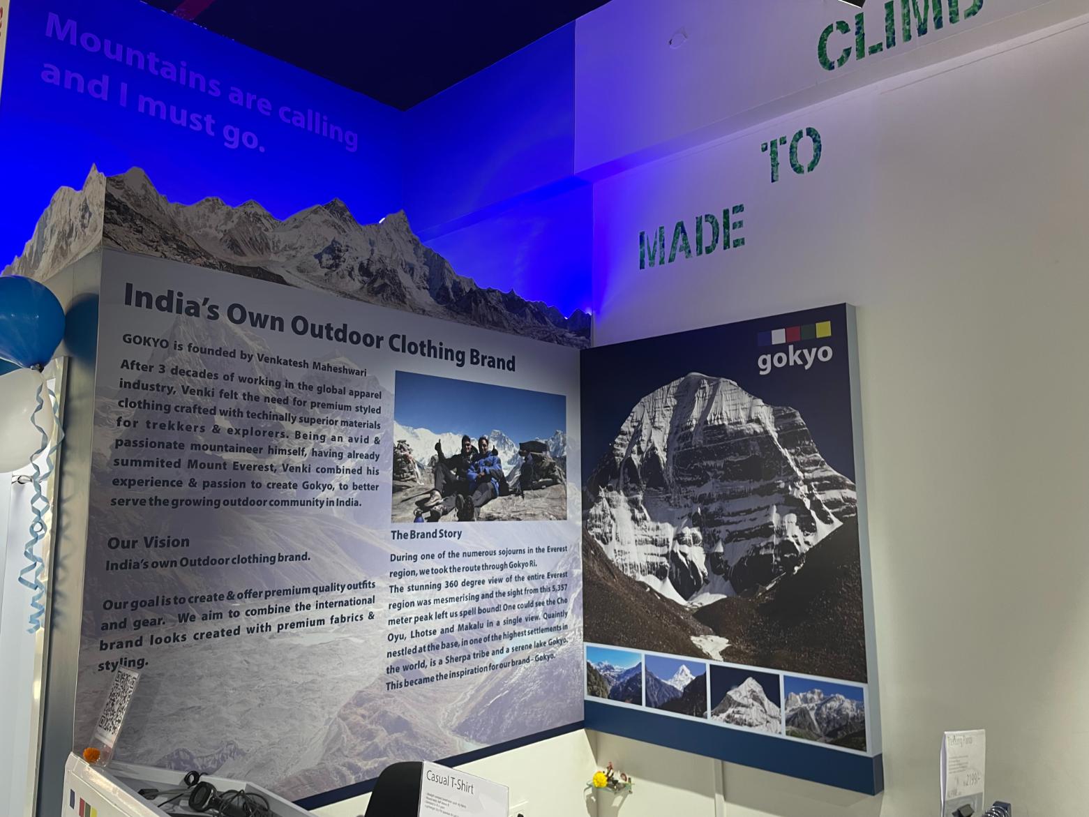 Poster at Gokyo Outdoor Clothing & Gear Malad store highlighting the brand’s history.
