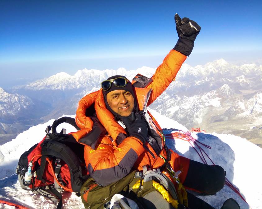 Venki (Venkatesh Maheshwari) Co-founder of Gokyo Outdoor Clothing & Gear at the top of Everest Summit.
